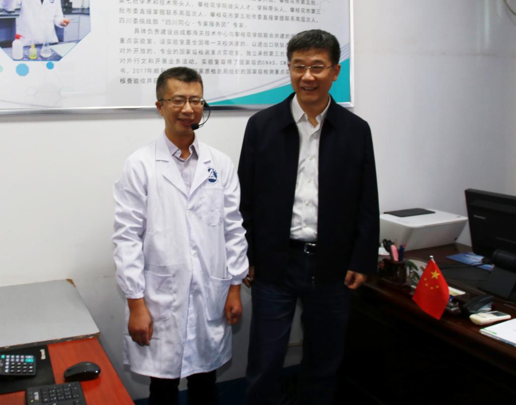 走访民进会员田从学专家工作室